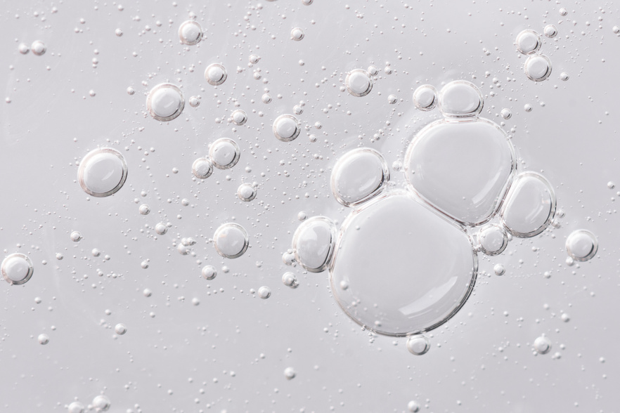 Transparent Gel Texture. Texture of Oil Serum with Bubbles. Mois